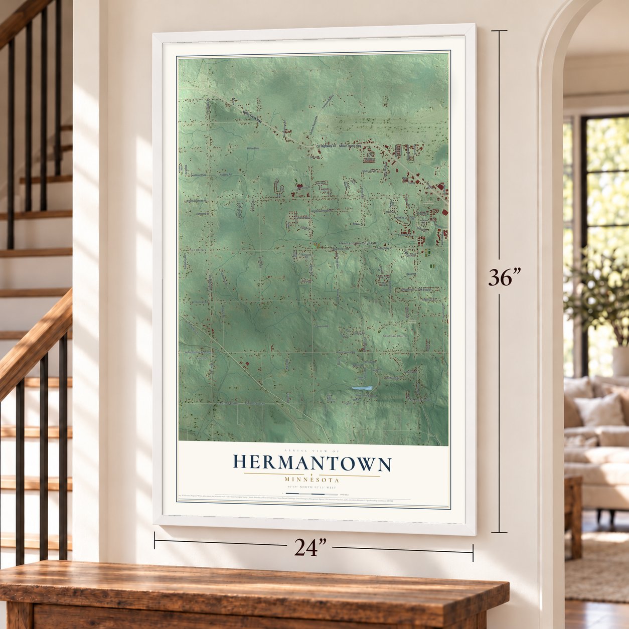 Hermantown, Minnesota map, 24 x 36 inch print in a white frame by a staircase