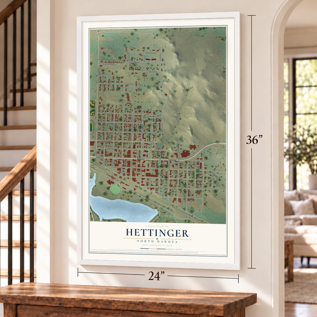 Hettinger, North Dakota map, 24 x 36 inch print in a white frame by a staircase
