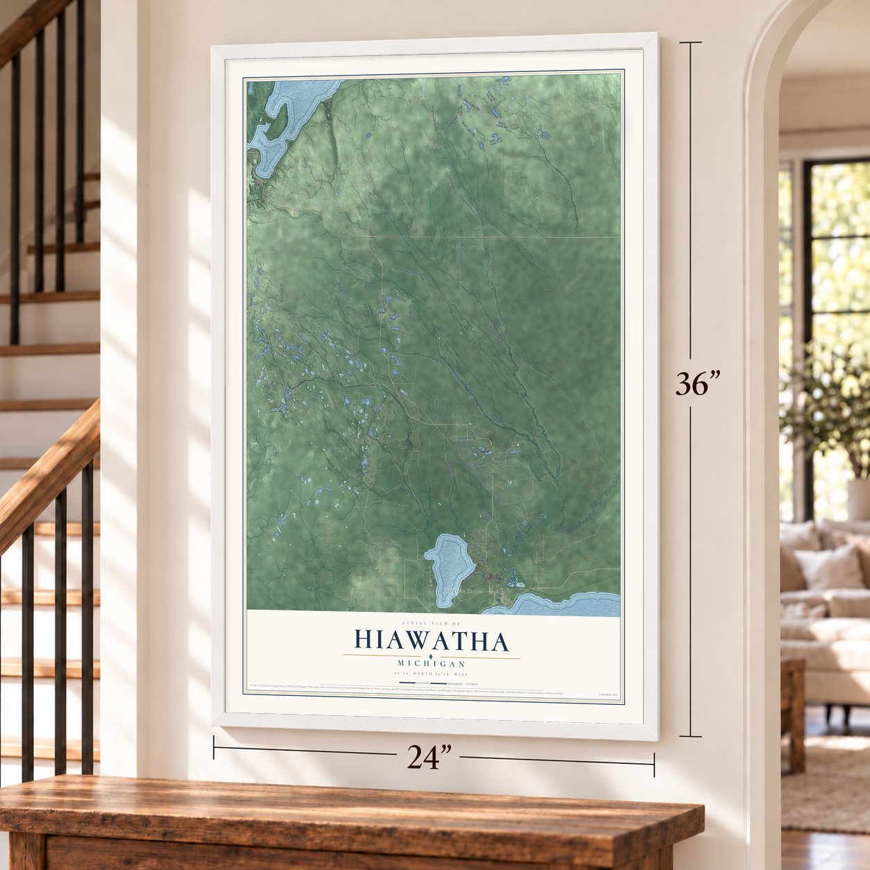 Hiawatha, Michigan map, 24 x 36 inch print in a white frame by a staircase