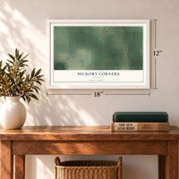 Hickory Corners, Michigan map, 12 x 18 inch print in a white frame in an entryway
