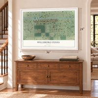 Hillsboro Pines, Florida map, 24 x 36 inch print in a white frame above a dresser by a staircase