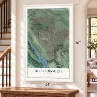 Hillsborough, California map, 24 x 36 inch print in a white frame by a staircase