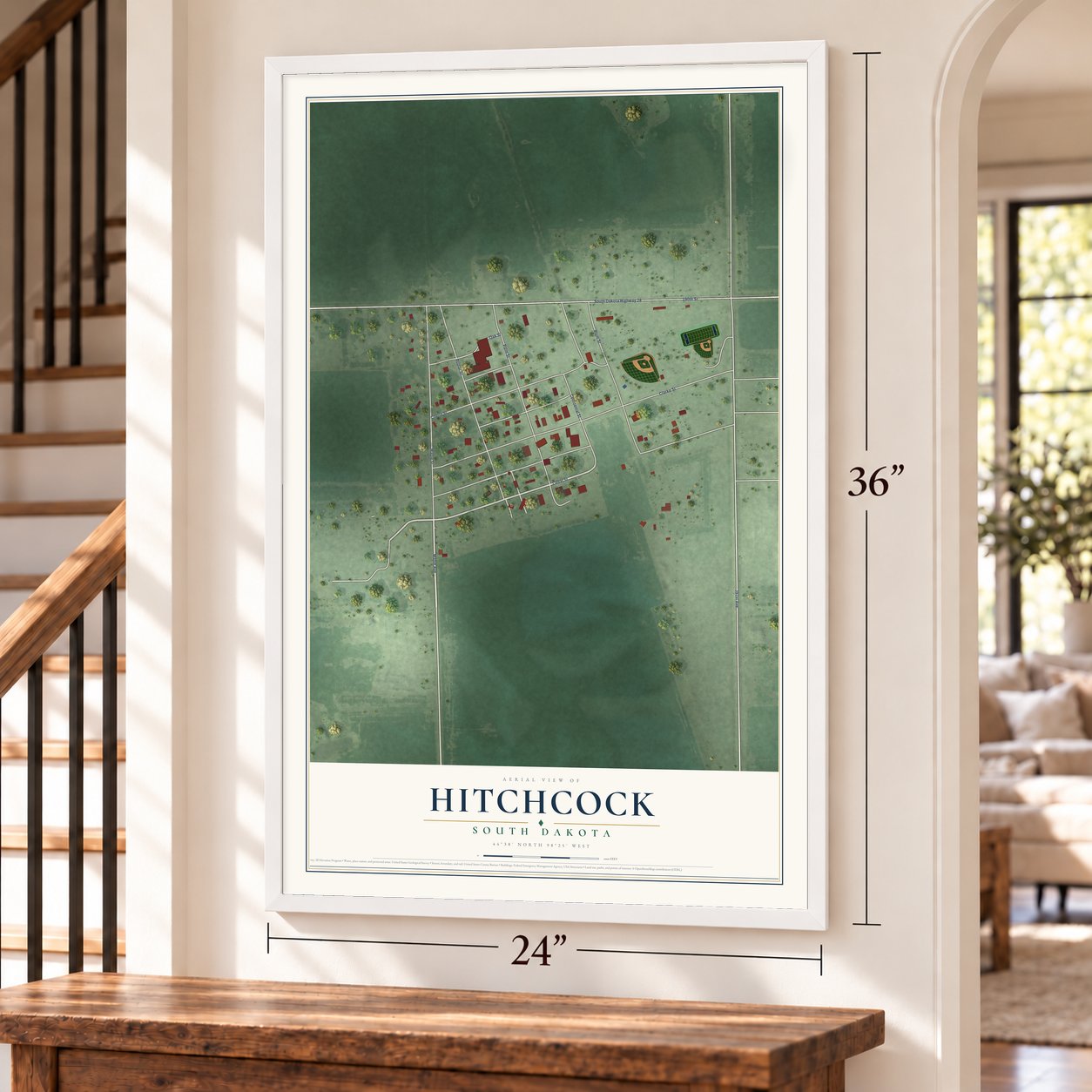 Hitchcock, South Dakota map, 24 x 36 inch print in a white frame by a staircase