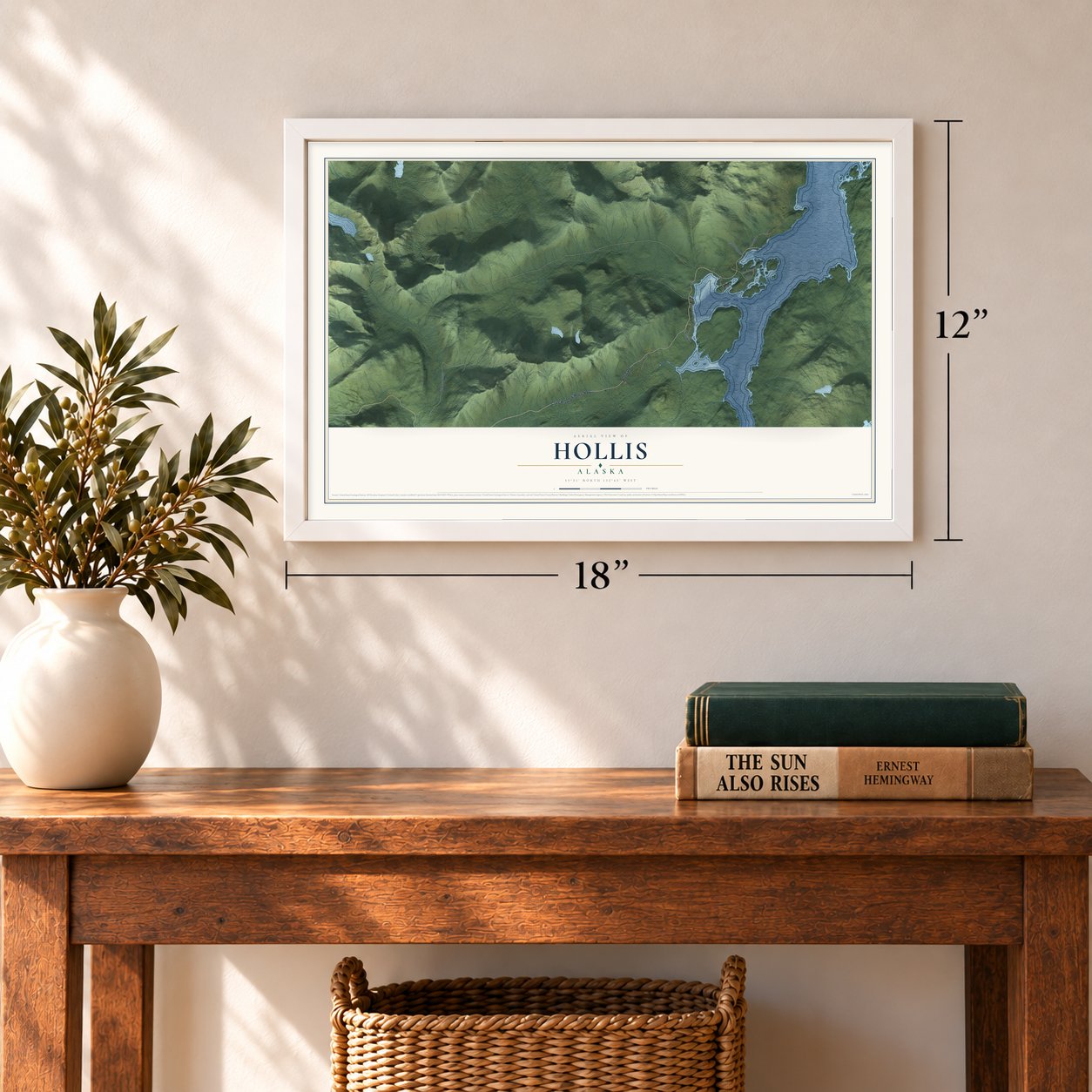 Hollis, Alaska map, 12 x 18 inch print in a white frame in an entryway