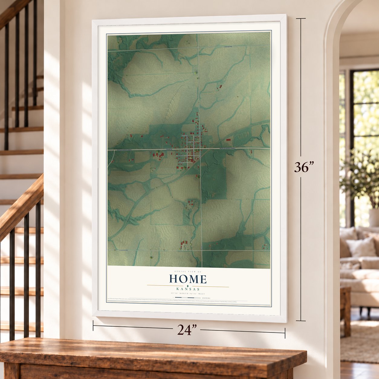 Home, Kansas map, 24 x 36 inch print in a white frame by a staircase