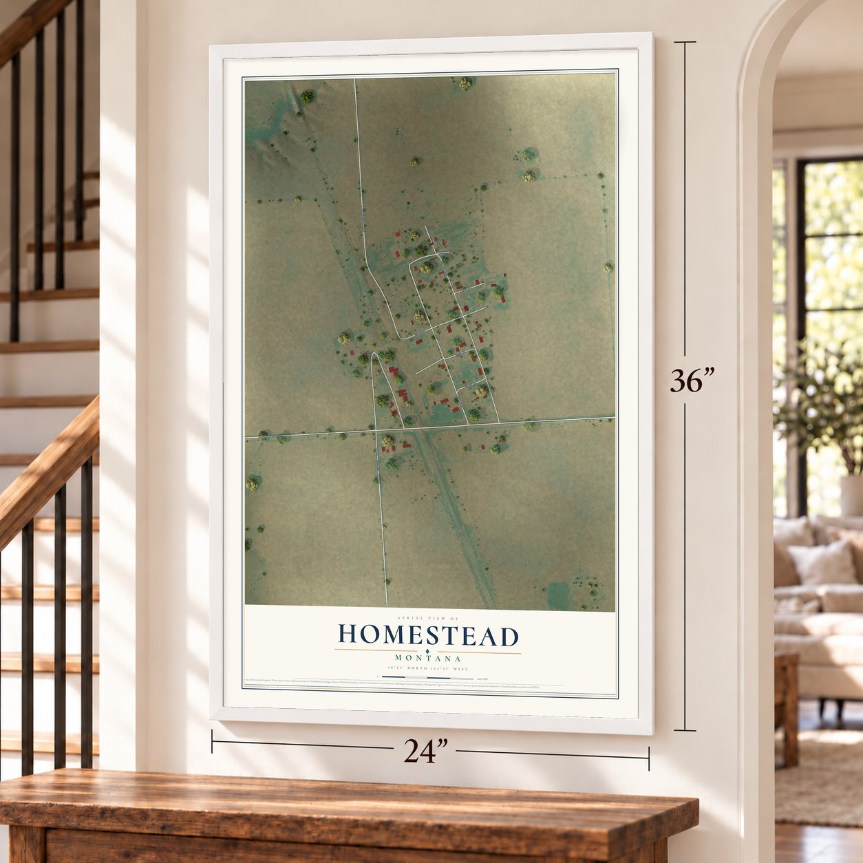 Homestead, Montana map, 24 x 36 inch print in a white frame by a staircase