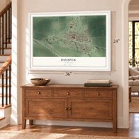 Hooper, Nebraska map, 24 x 36 inch print in a white frame above a dresser by a staircase