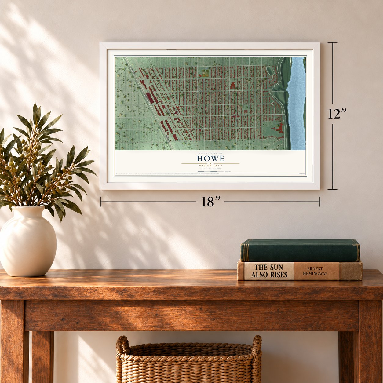 Howe, Minnesota map, 12 x 18 inch print in a white frame in an entryway