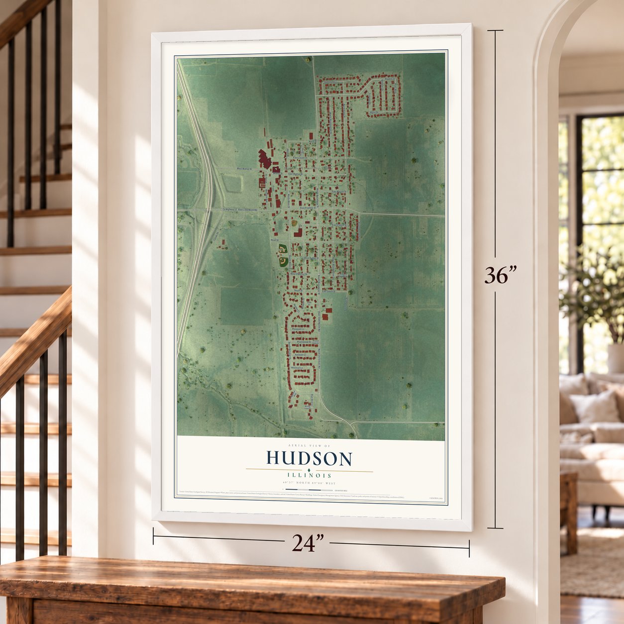 Hudson, Illinois map, 24 x 36 inch print in a white frame by a staircase