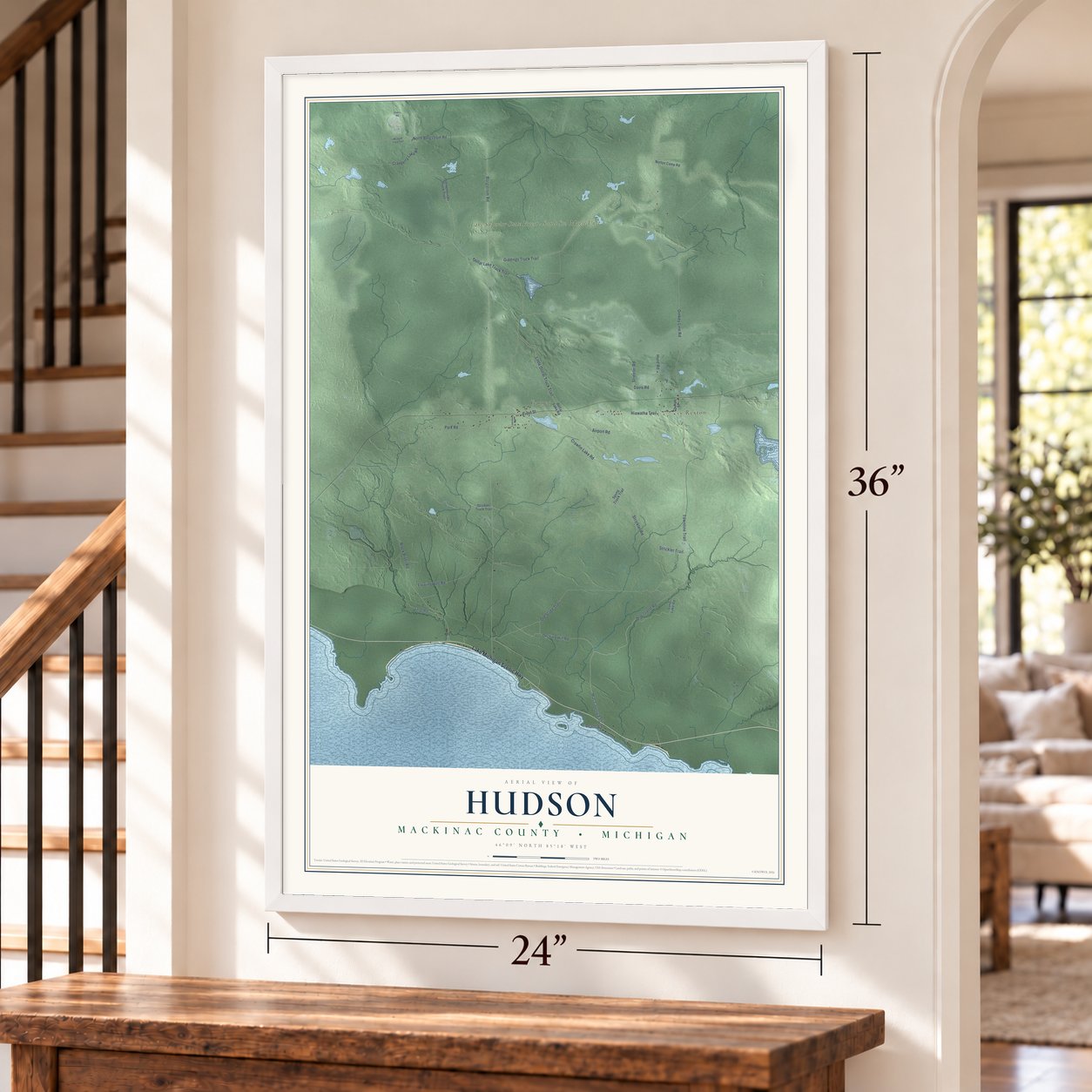 Hudson, Mackinac County, Michigan map, 24 x 36 inch print in a white frame by a staircase