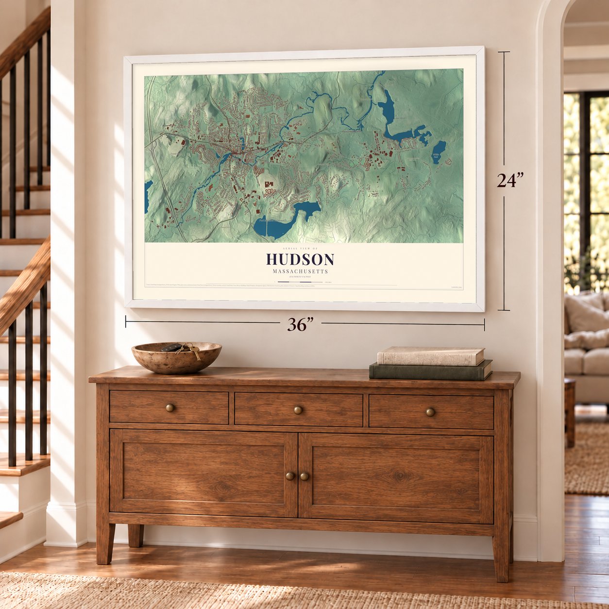 Hudson, Massachusetts map, 24 x 36 inch print in a white frame above a dresser by a staircase