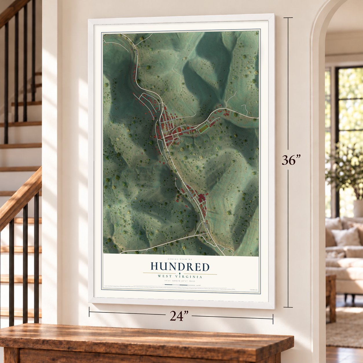 Hundred, West Virginia map, 24 x 36 inch print in a white frame by a staircase