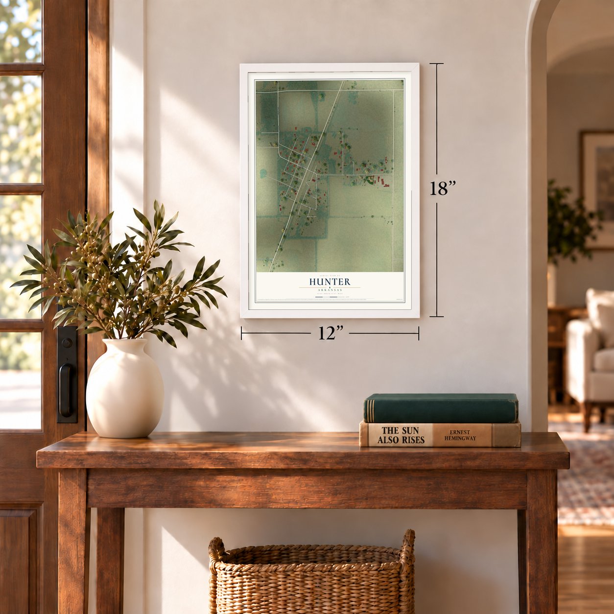 Hunter, Arkansas map, 12 x 18 inch print in a white frame in an entryway