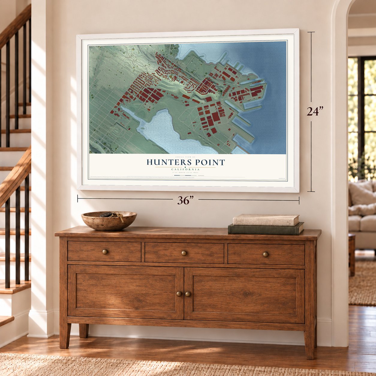 Hunters Point, California map, 24 x 36 inch print in a white frame above a dresser by a staircase