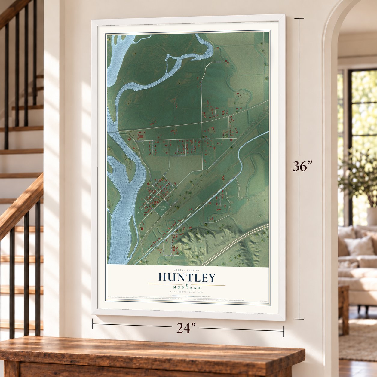 Huntley, Montana map, 24 x 36 inch print in a white frame by a staircase