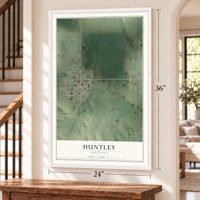 Huntley, Nebraska map, 24 x 36 inch print in a white frame by a staircase