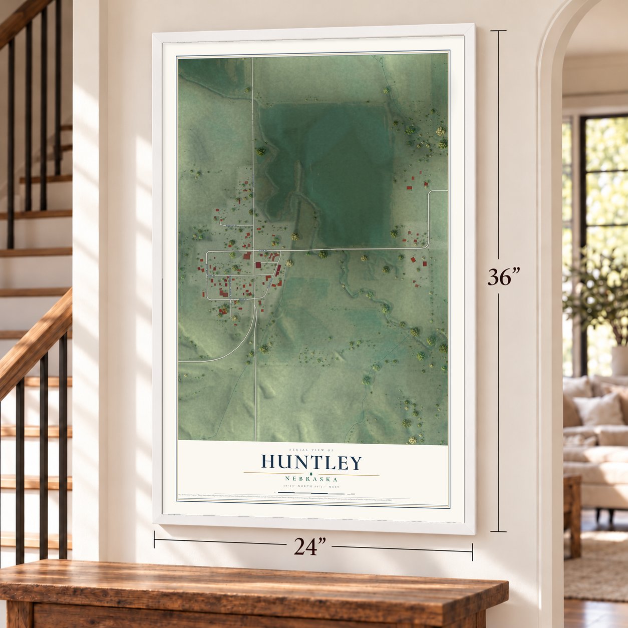 Huntley, Nebraska map, 24 x 36 inch print in a white frame by a staircase