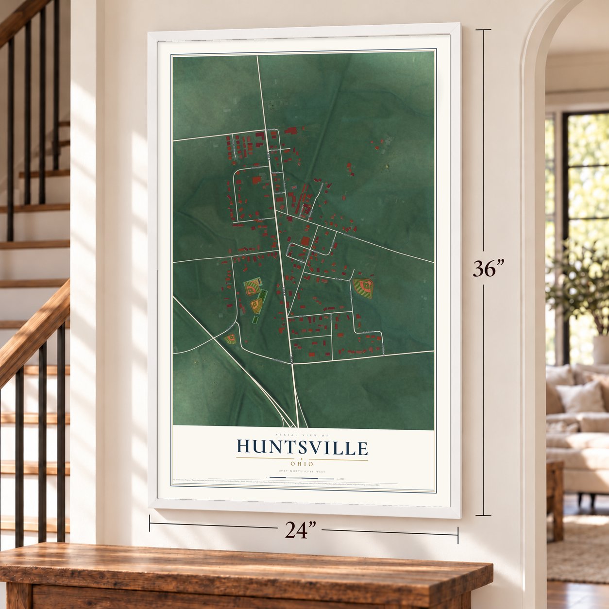 Huntsville, Ohio map, 24 x 36 inch print in a white frame by a staircase