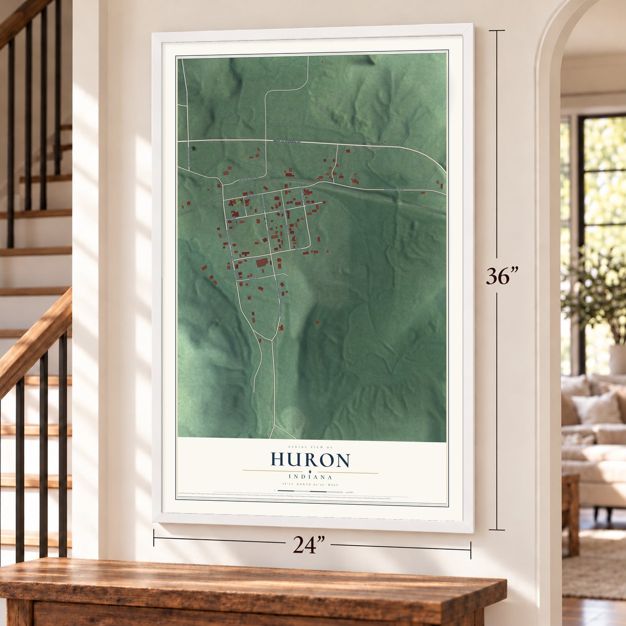 Huron, Indiana map, 24 x 36 inch print in a white frame by a staircase