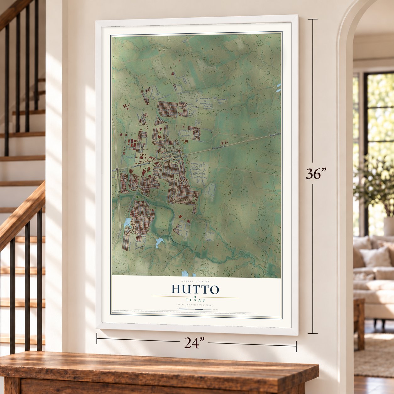 Hutto, Texas map, 24 x 36 inch print in a white frame by a staircase