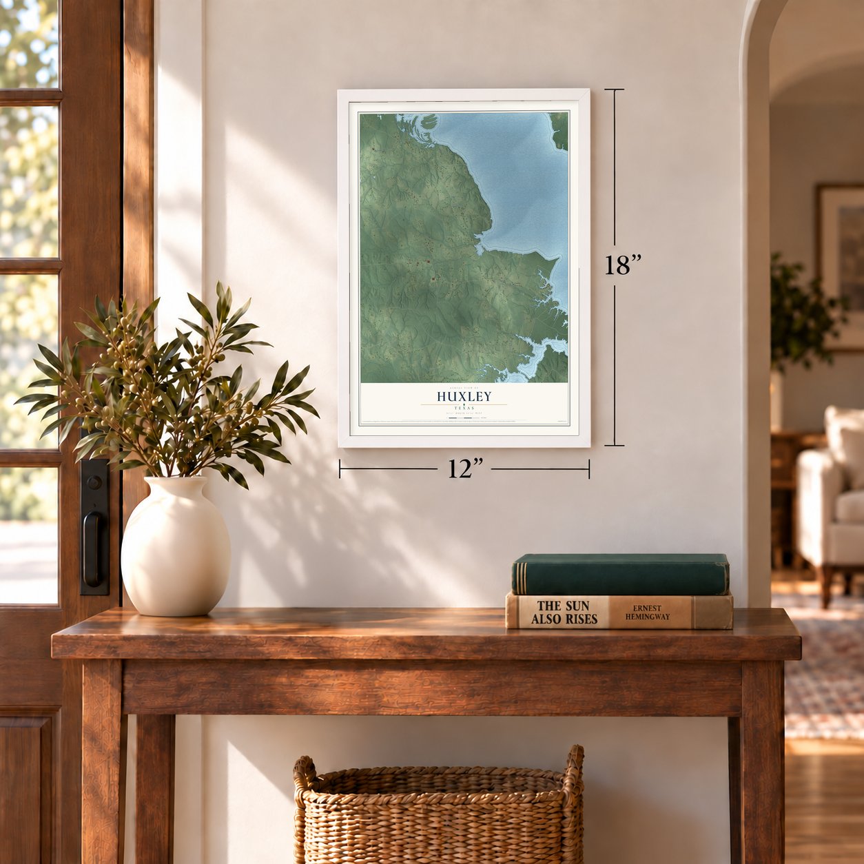 Huxley, Texas map, 12 x 18 inch print in a white frame in an entryway