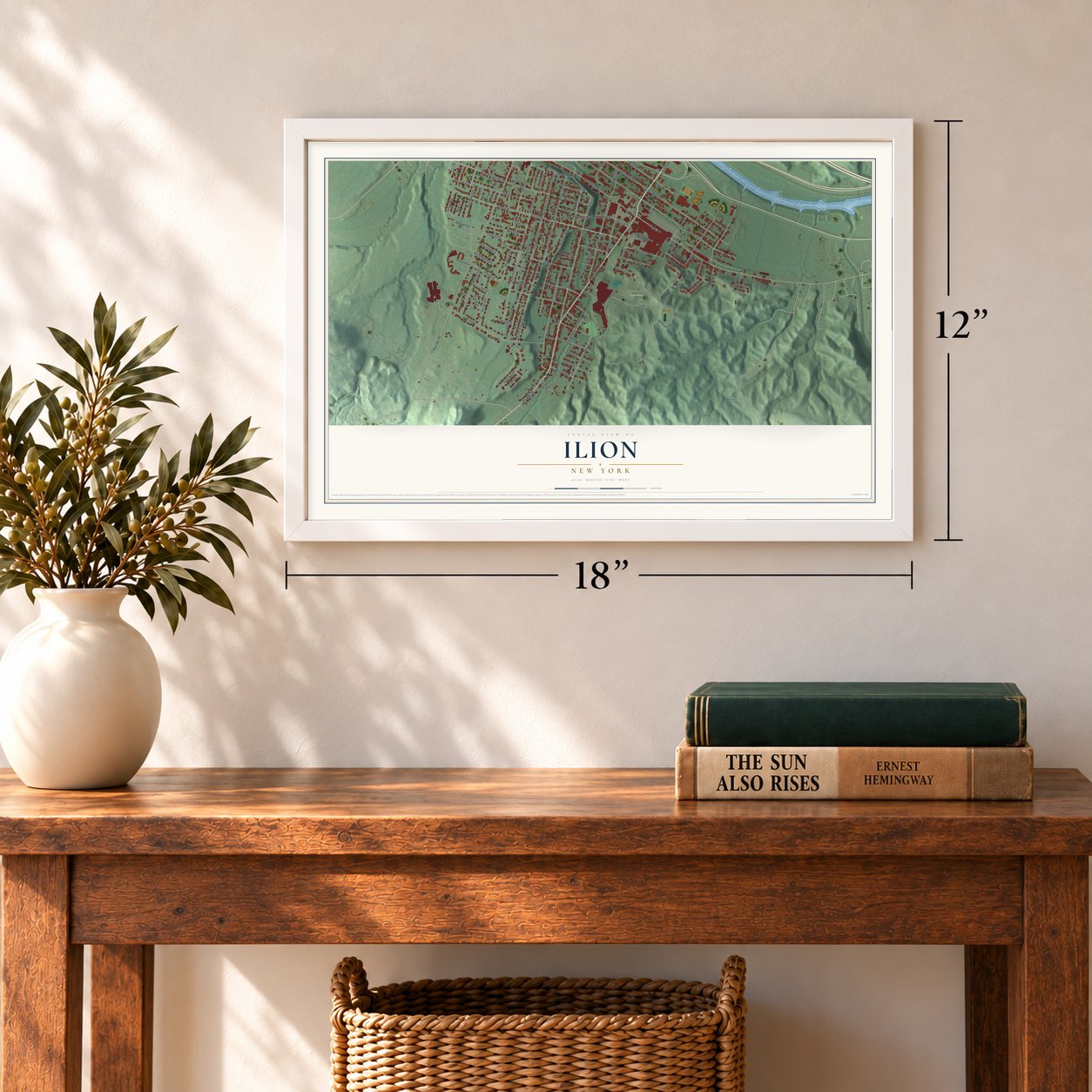 Ilion, New York map, 12 x 18 inch print in a white frame in an entryway