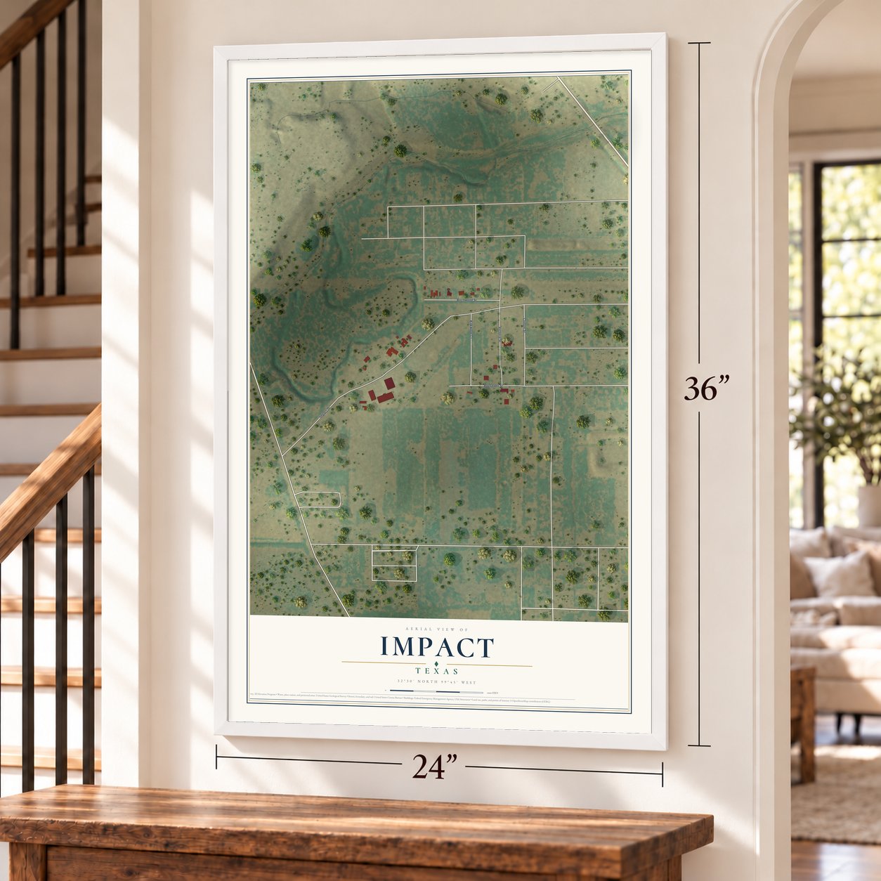 Impact, Texas map, 24 x 36 inch print in a white frame by a staircase