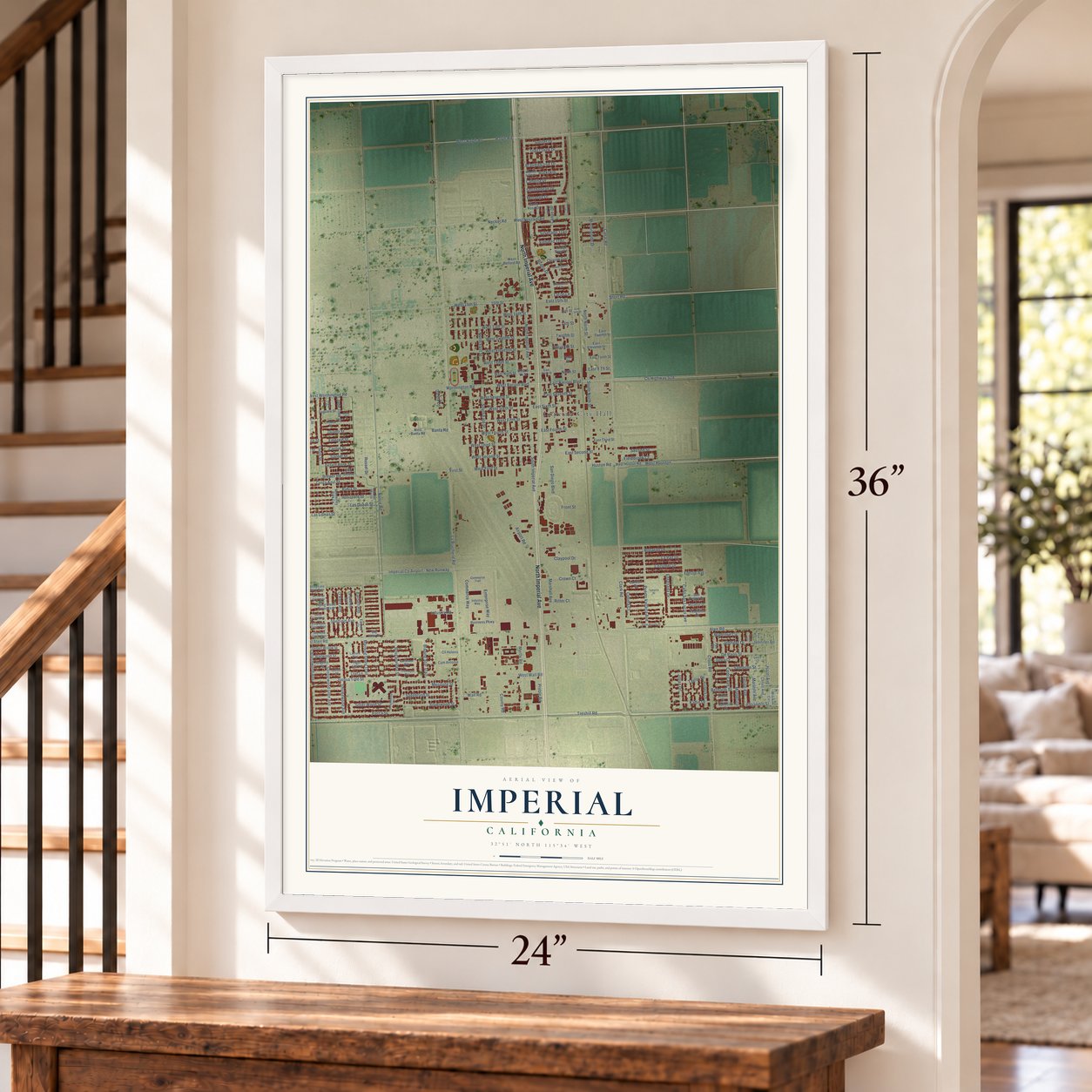 Imperial, California map, 24 x 36 inch print in a white frame by a staircase