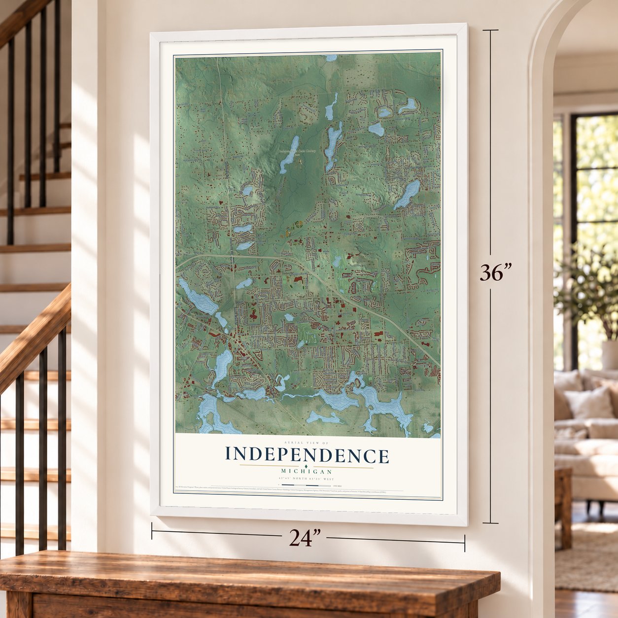 Independence, Michigan map, 24 x 36 inch print in a white frame by a staircase