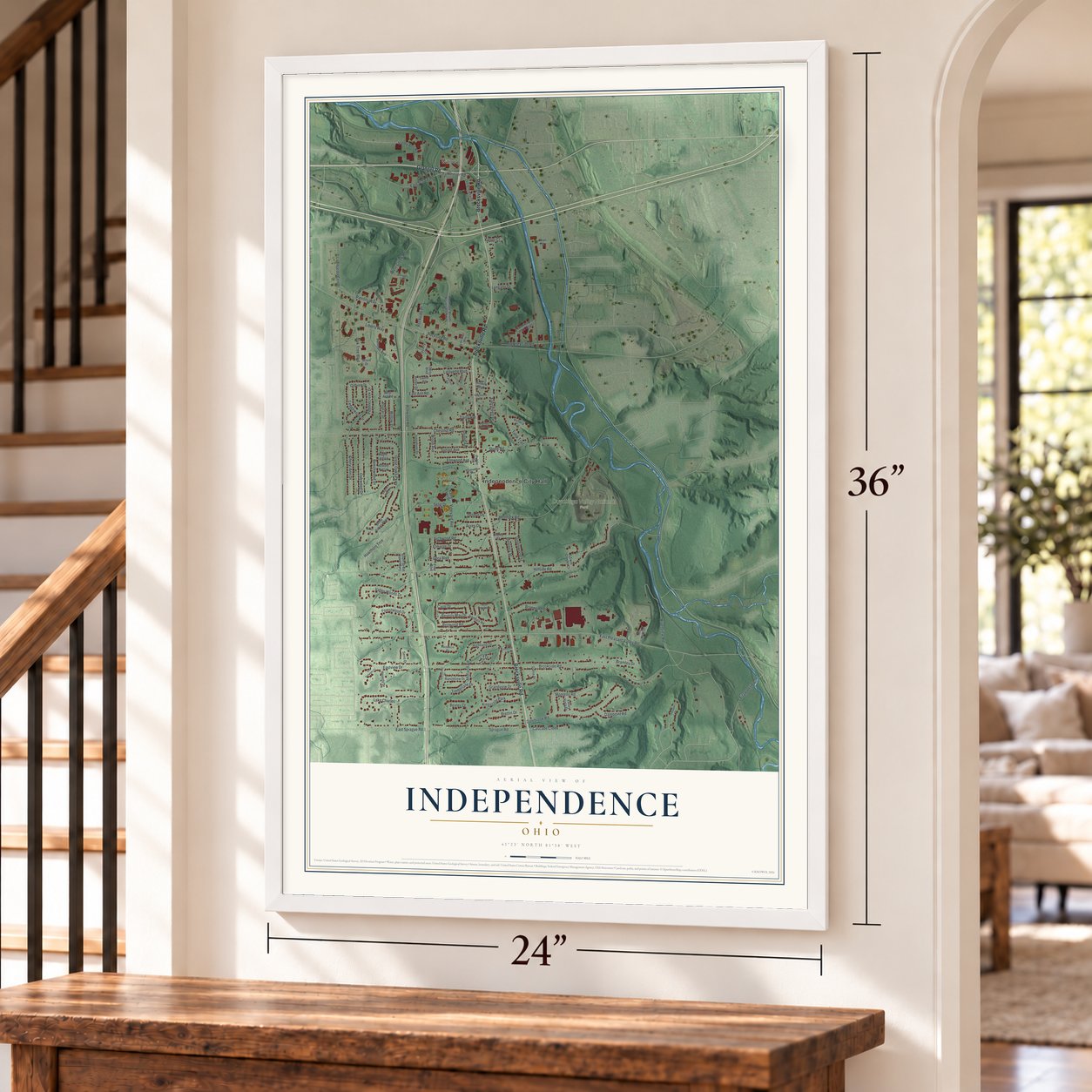 Independence, Ohio map, 24 x 36 inch print in a white frame by a staircase