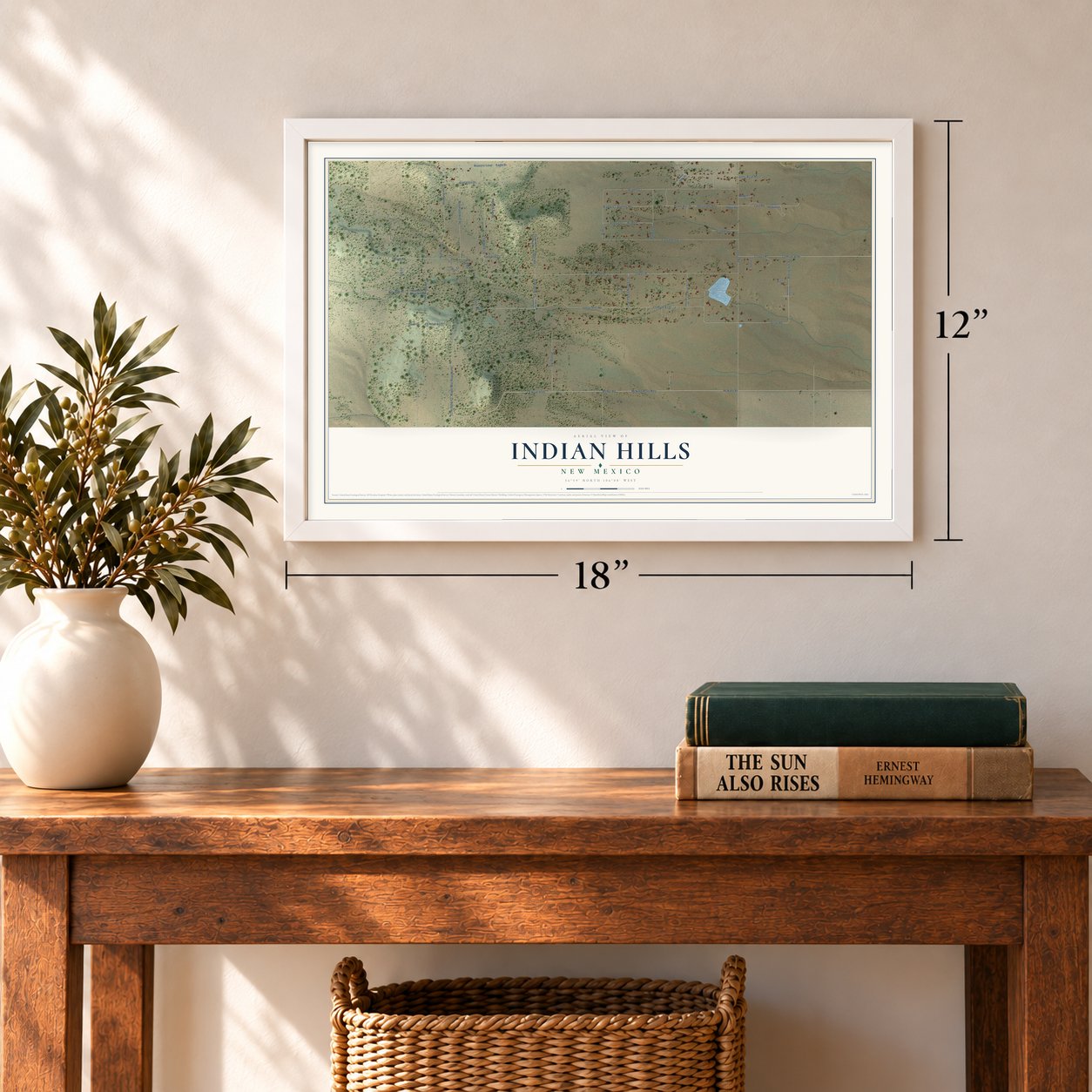 Indian Hills, New Mexico map, 12 x 18 inch print in a white frame in an entryway