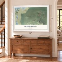 Indian Springs, Nevada map, 24 x 36 inch print in a white frame above a dresser by a staircase