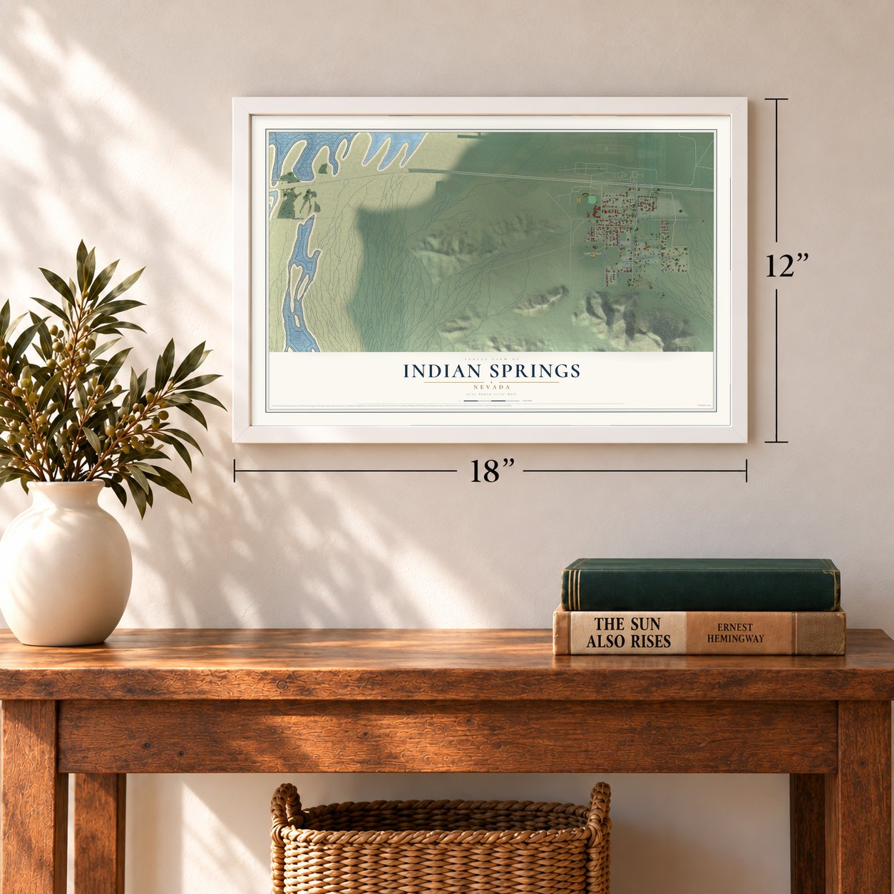 Indian Springs, Nevada map, 12 x 18 inch print in a white frame in an entryway