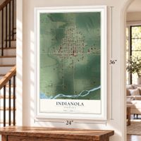 Indianola, Nebraska map, 24 x 36 inch print in a white frame by a staircase