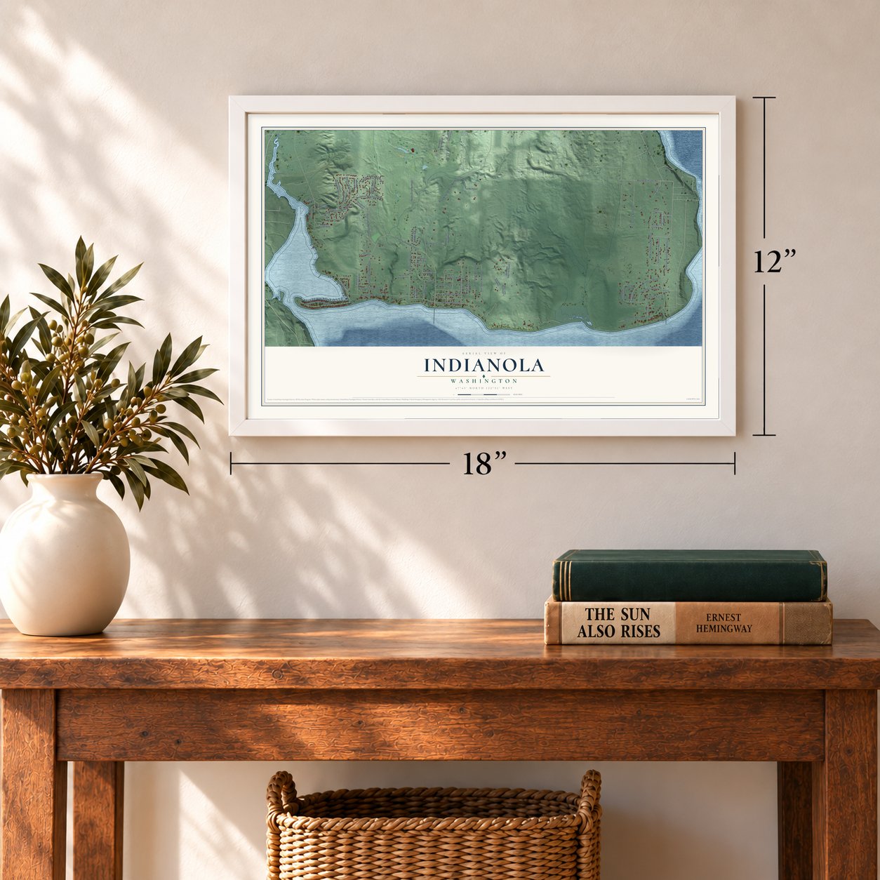Indianola, Washington map, 12 x 18 inch print in a white frame in an entryway
