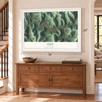 Inez, Kentucky map, 24 x 36 inch print in a white frame above a dresser by a staircase