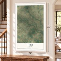 Inez, Texas map, 24 x 36 inch print in a white frame by a staircase