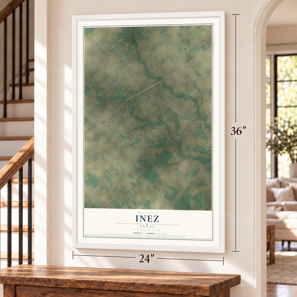 Inez, Texas map, 24 x 36 inch print in a white frame by a staircase