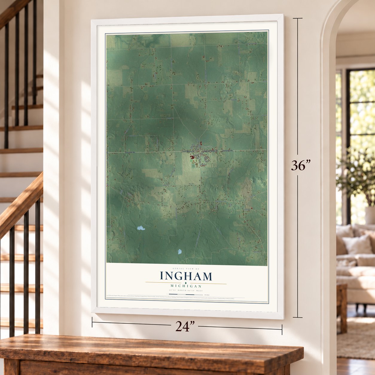 Ingham, Michigan map, 24 x 36 inch print in a white frame by a staircase
