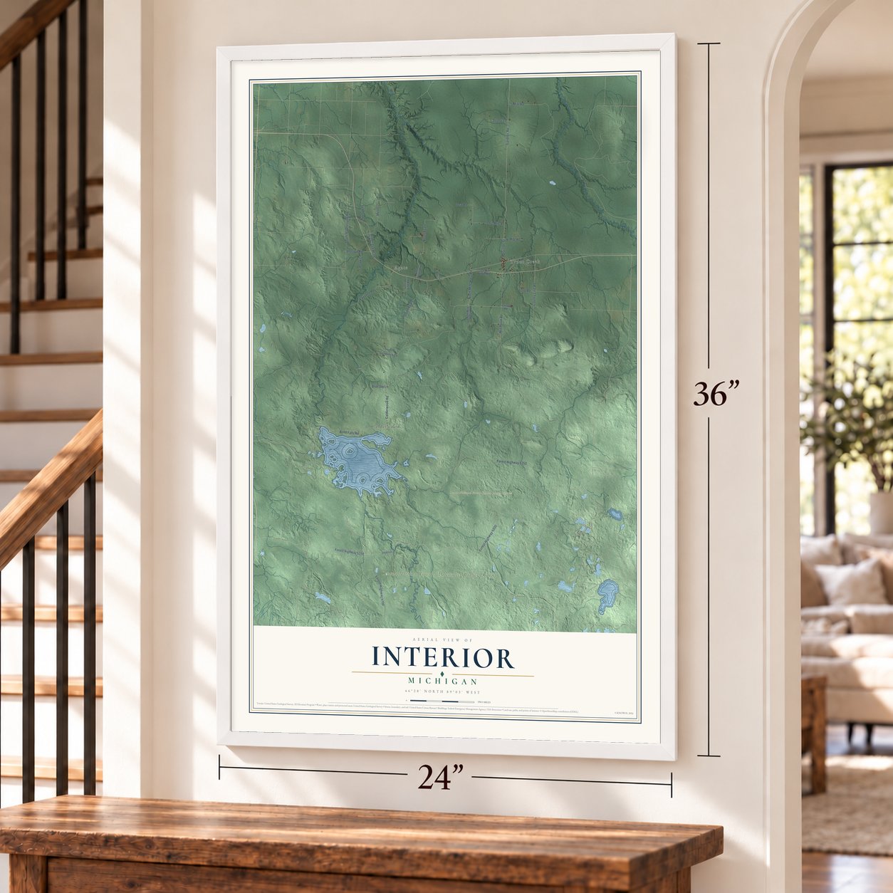 Interior, Michigan map, 24 x 36 inch print in a white frame by a staircase