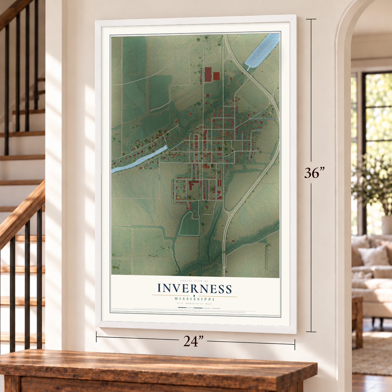 Inverness, Mississippi map, 24 x 36 inch print in a white frame by a staircase