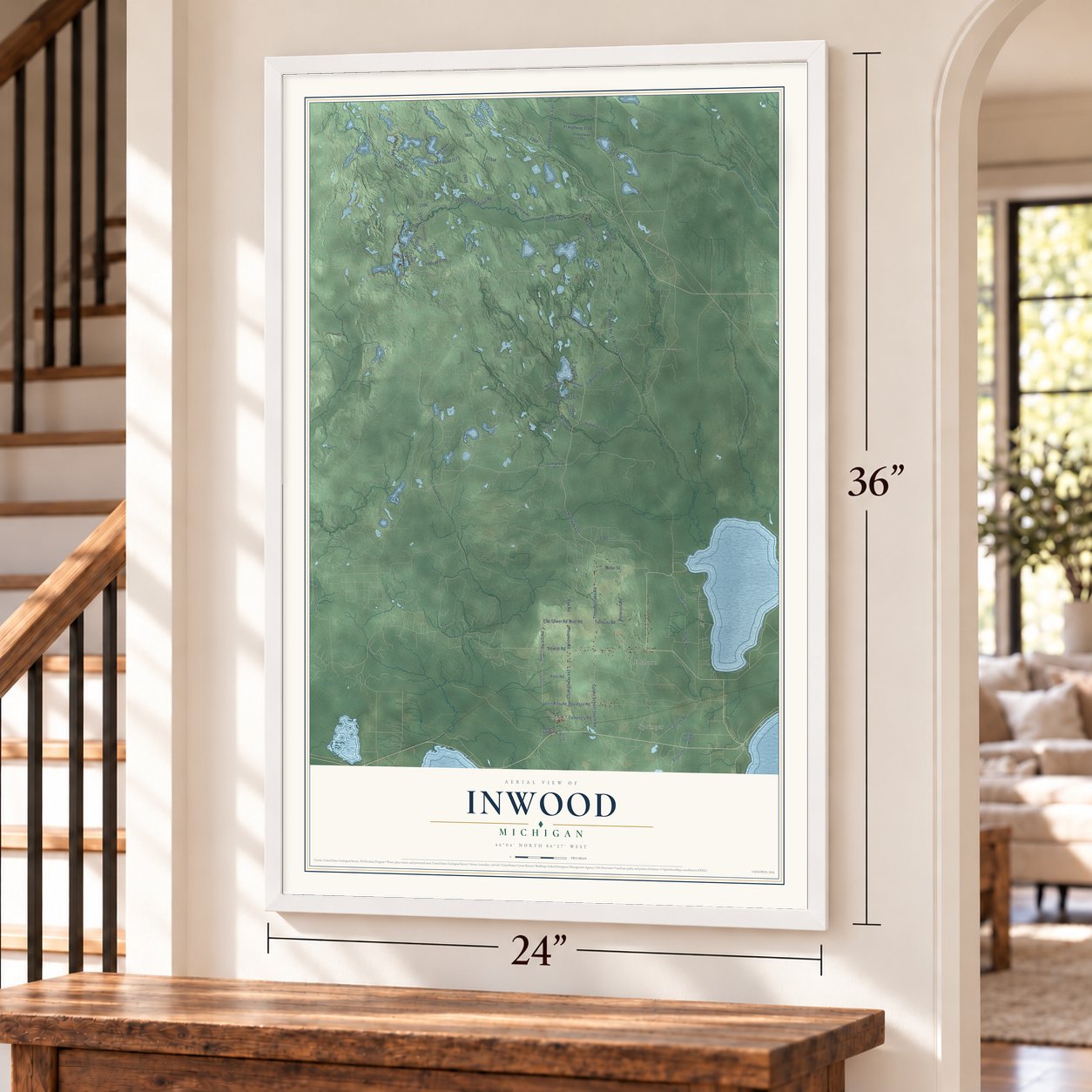 Inwood, Michigan map, 24 x 36 inch print in a white frame by a staircase