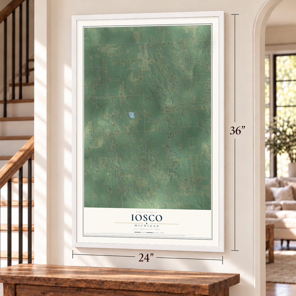 Iosco, Michigan map, 24 x 36 inch print in a white frame by a staircase