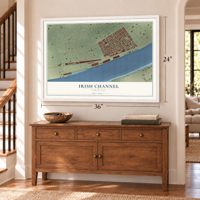 Irish Channel, Louisiana map, 24 x 36 inch print in a white frame above a dresser by a staircase