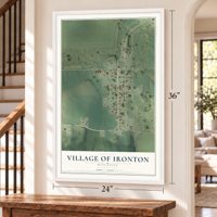 Ironton, Wisconsin map, 24 x 36 inch print in a white frame by a staircase