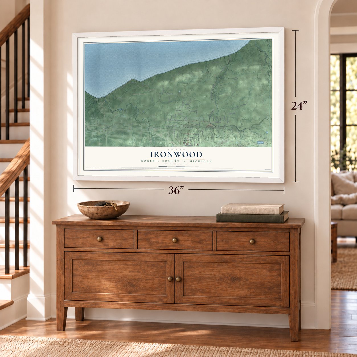 Ironwood, Gogebic County, Michigan map, 24 x 36 inch print in a white frame above a dresser by a staircase