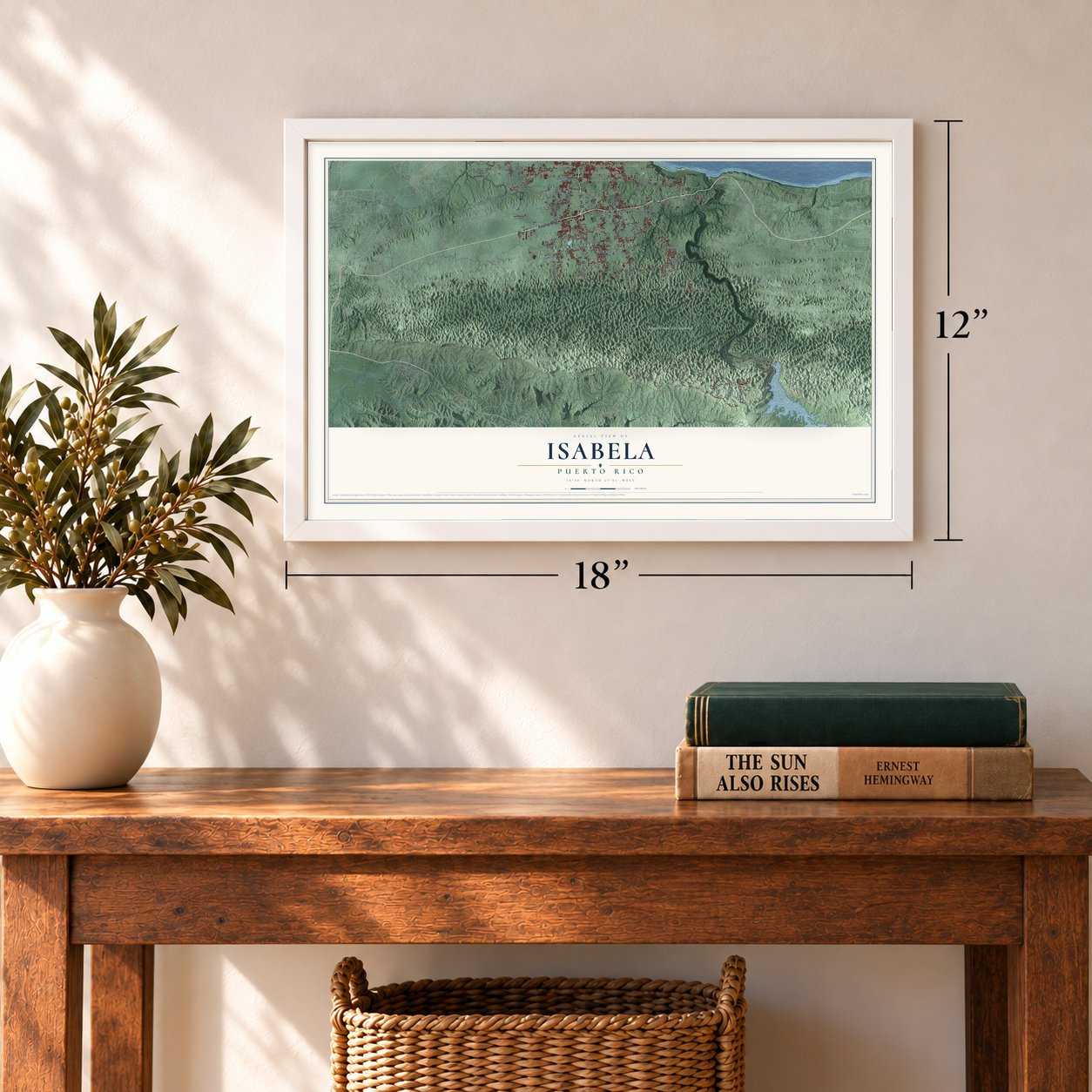 Isabela, Puerto Rico map, 12 x 18 inch print in a white frame in an entryway