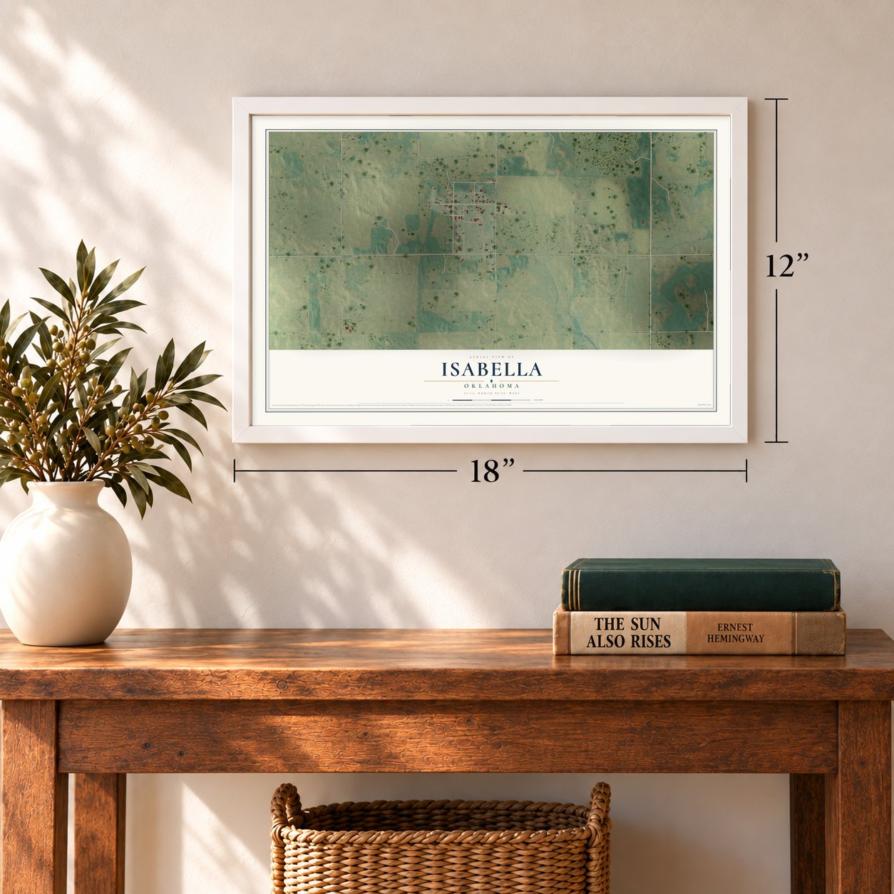Isabella, Oklahoma map, 12 x 18 inch print in a white frame in an entryway