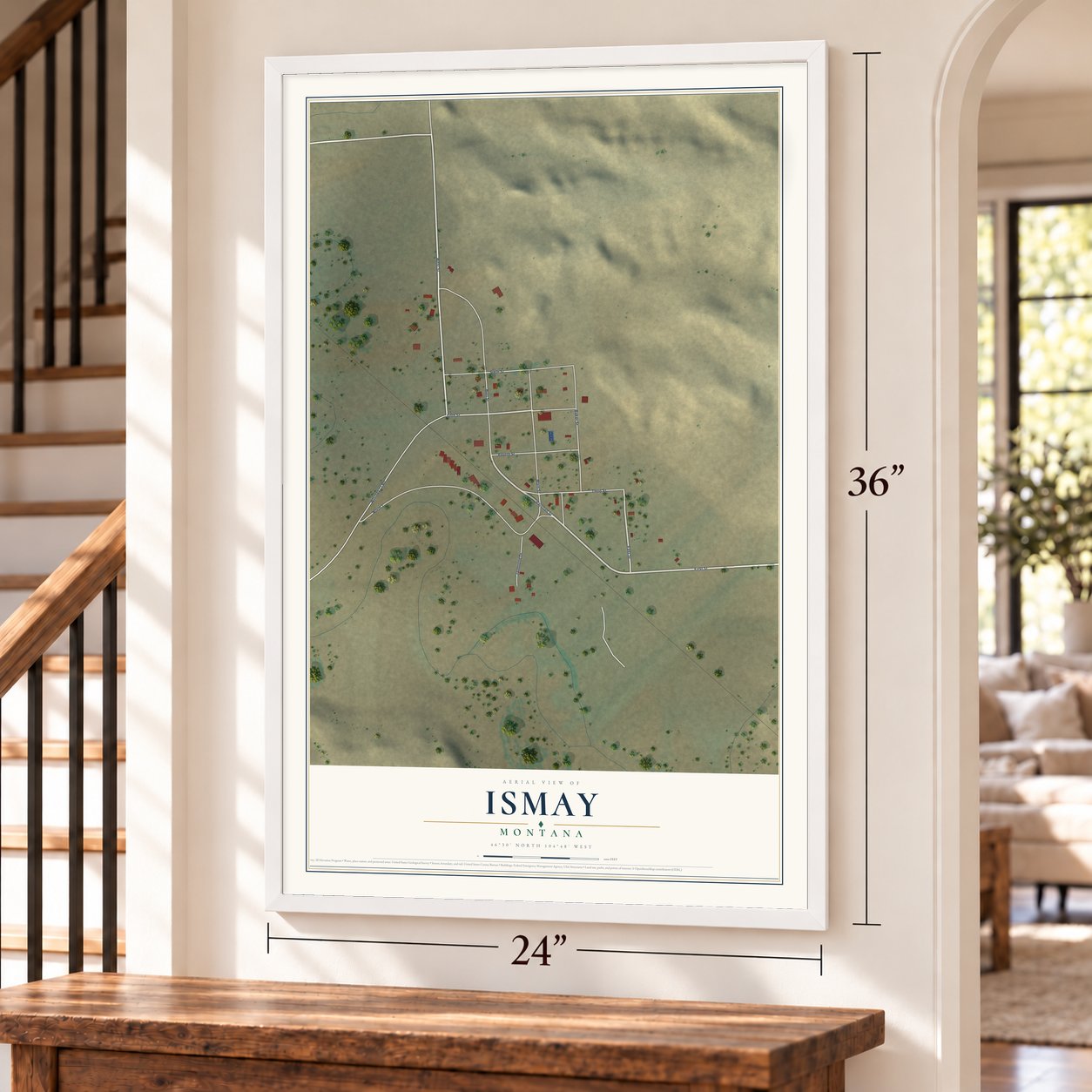 Ismay, Montana map, 24 x 36 inch print in a white frame by a staircase
