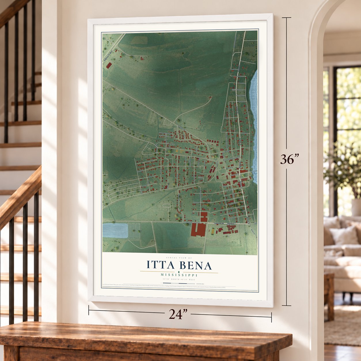 Itta Bena, Mississippi map, 24 x 36 inch print in a white frame by a staircase